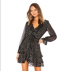 Little Black Dress with ruffles and silver dots